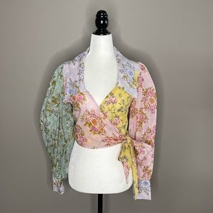 Free People wrap shirt. Brand new. Never worn. Absolutely gorgeous! Extra small